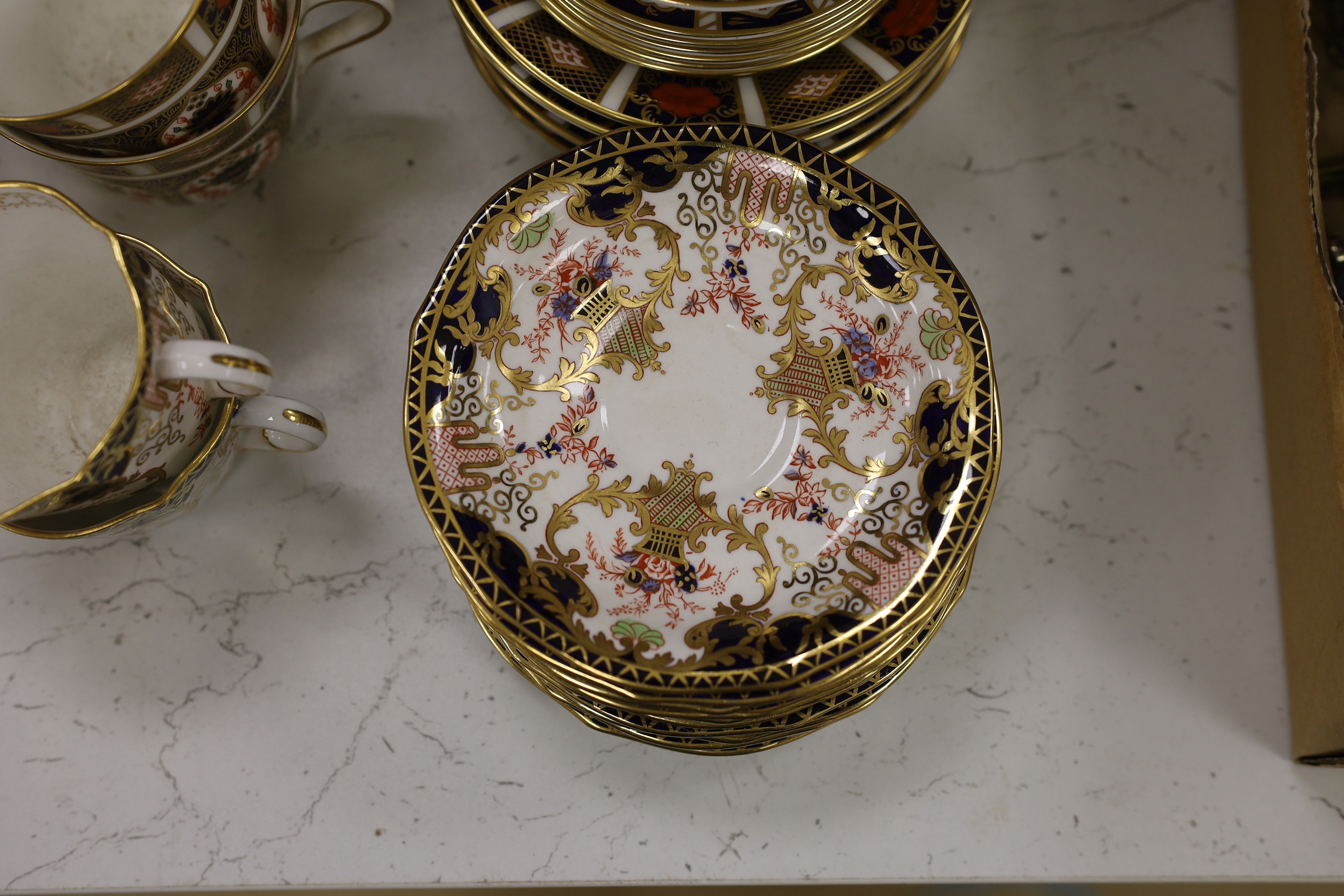 A collection of Royal Crown Derby tea and coffee wares to include a tray